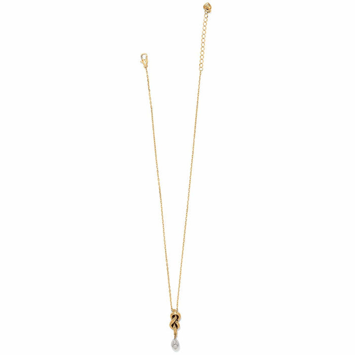 Brighton gold-tone chain necklace with knotted pendant and silver-tone teardrop accent on a white background