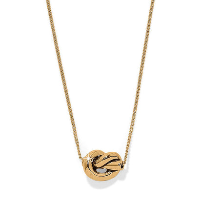 Brighton pendant necklace with gold-plated knot centerpiece on a delicate gold-plated chain on a white background