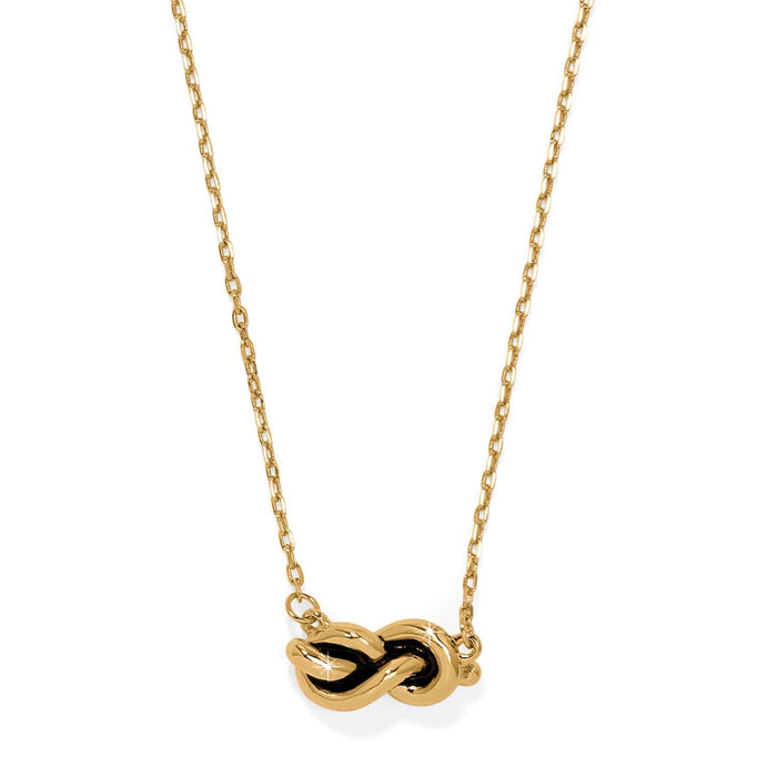 Brighton pendant necklace with gold-plated infinity knot charm on delicate cable chain on a white background