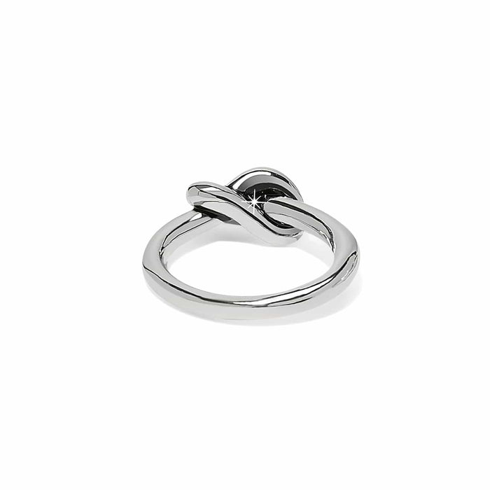 Brighton ring shown from the back with polished silver-tone knot detail and slim band on a white background