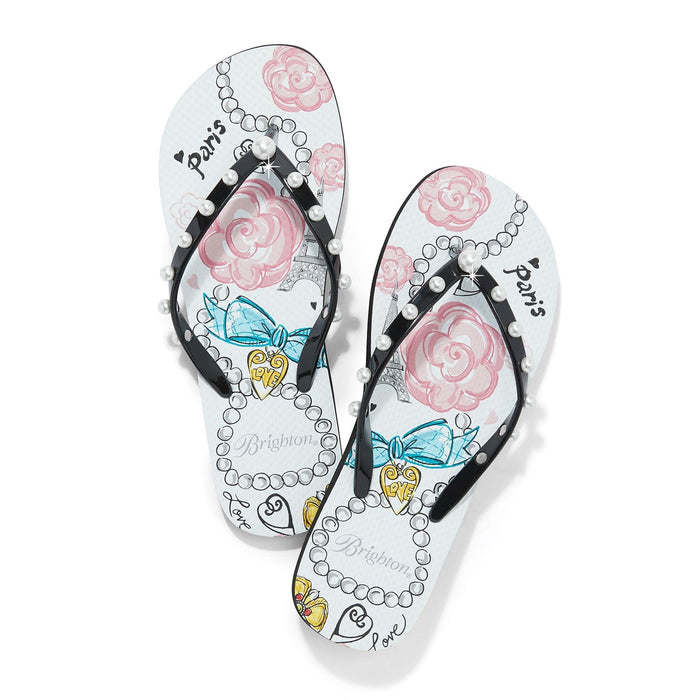 Brighton rubber flip-flops with Paris-themed print, pink roses, pearls, and black studded straps on a white background