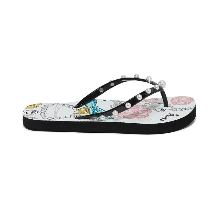 Brighton black rubber flip-flops with pearl-studded straps and Paris-themed floral print footbed on a white background