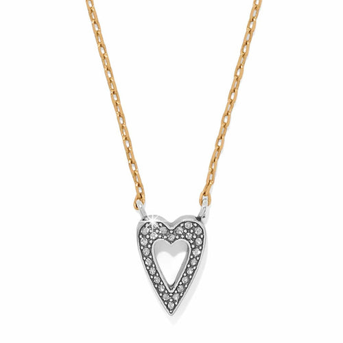 Brighton pendant necklace with silver-tone crystal heart on a gold-tone chain on a white background