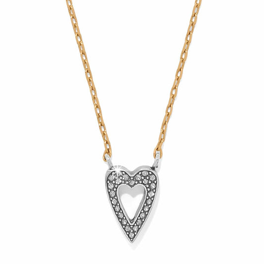 Brighton pendant necklace with silver-tone crystal heart on a gold-tone chain on a white background