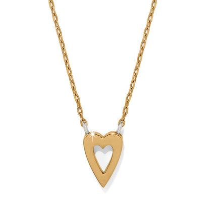 Brighton pendant necklace with two-tone heart cutout design and delicate gold-tone chain on a white background