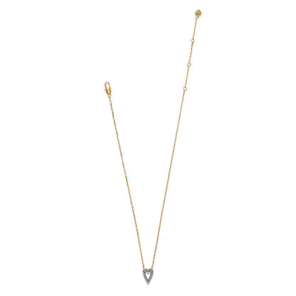 Brighton pendant necklace with two-tone heart-shaped crystal pendant and gold-tone chain with lobster clasp on a white background