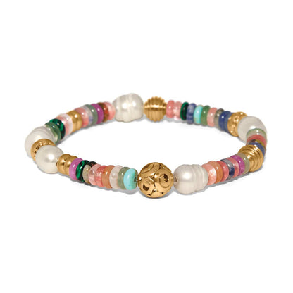 Brighton beaded bracelet with glass pearls, mixed gemstones, dyed jade, and gold-plated accent beads on a white background