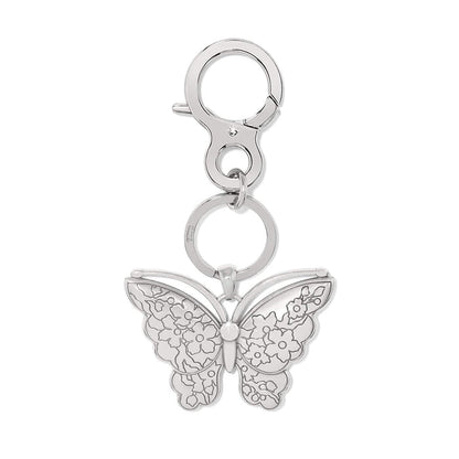 Brighton keychain with silver-plated butterfly charm featuring engraved floral wing detail and lobster clasp on a white background