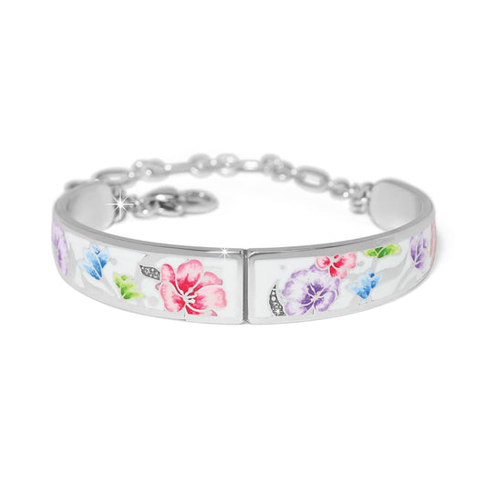 Brighton silver-plated bangle bracelet with colorful enamel floral design and crystal accents on a white background