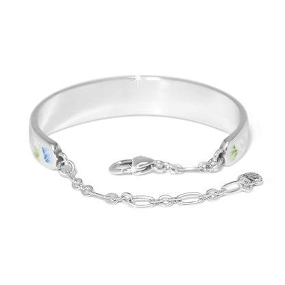 Brighton bangle bracelet with silver-plated finish, enamel floral accents, and chain clasp closure on a white background