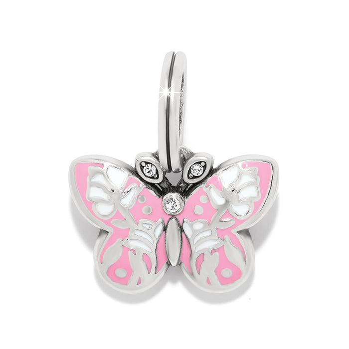 Brighton butterfly charm with pink and white enamel wings, crystal accents, and silver-plated finish on a white background