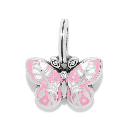 Brighton butterfly charm with pink and white enamel wings, crystal accents, and silver-plated finish on a white background