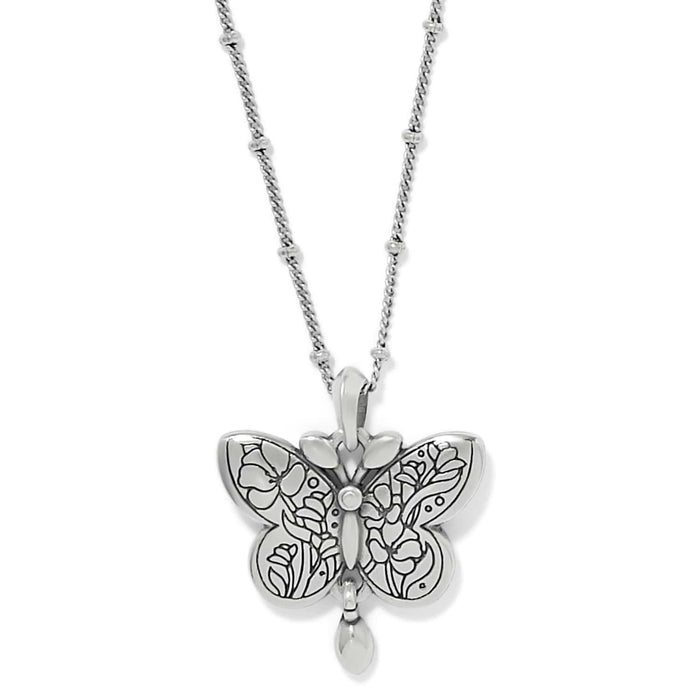 Brighton pendant necklace with silver-plated butterfly featuring engraved floral wing details on beaded chain on a white background