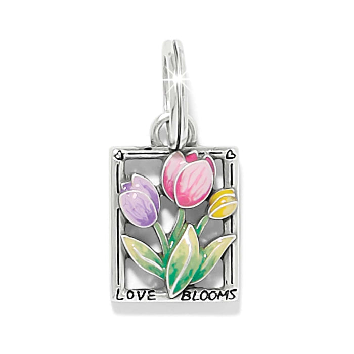 Brighton charm with colorful enamel tulips, silver-plated frame, and Love Blooms inscription on a white background