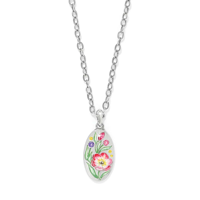 Brighton pendant necklace with silver-plated oval featuring enamel floral design and colorful crystal accents on a white background