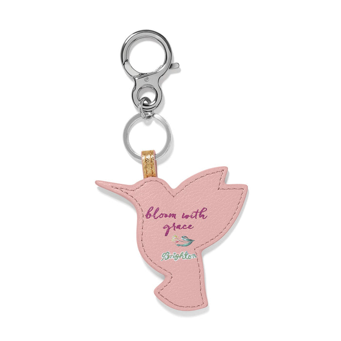 Brighton hummingbird keychain in pink leather with bloom with grace text and silver-tone clasp on a white background