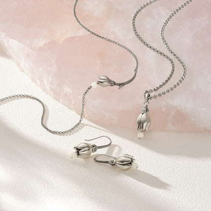 Brighton silver-plated jewelry set styled with rose quartz stone, featuring tulip-shaped pendant, earrings, and chain necklaces
