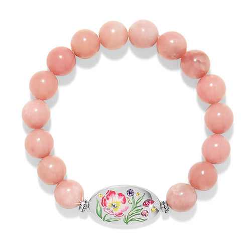Brighton beaded bracelet with pink stones and silver-plated floral enamel station with crystal accents on a white background