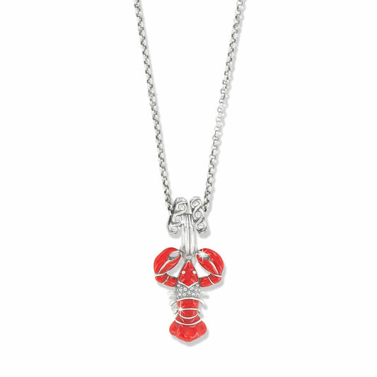 Brighton pendant necklace with red enamel lobster charm, crystal accents, and silver-plated chain on a white background