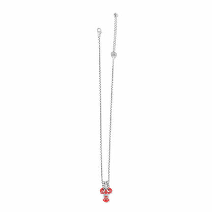 Brighton necklace with silver-plated chain and red enamel lobster pendant with crystal accents on a white background