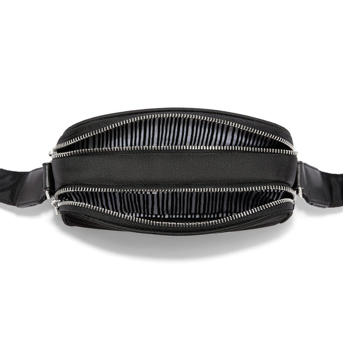Close-up of Brighton black nylon belt bag shown open with silver-tone zippers and striped interior lining