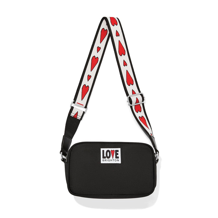 Brighton black crossbody handbag with Love Brighton patch and red heart print adjustable strap on a white background