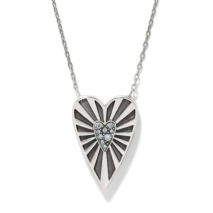 Brighton heart pendant necklace with silver-plated rays, black accents, and crystal center heart on a white background