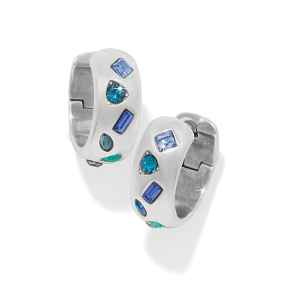 Brighton hoop earrings with silver-plated finish, white enamel, and blue crystals in mixed shapes on a white background