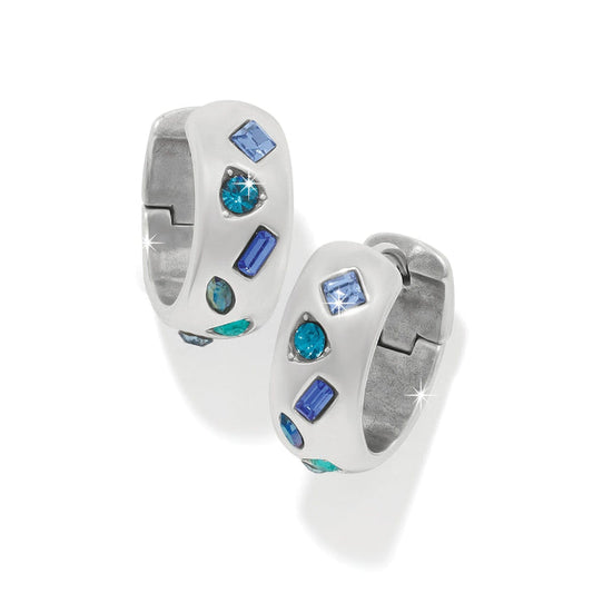 Brighton hoop earrings with silver-plated finish, white enamel, and blue crystals in mixed shapes on a white background