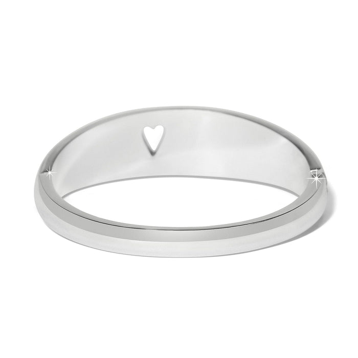 Brighton silver-plated bangle bracelet with cut-out heart detail and polished finish on a white background