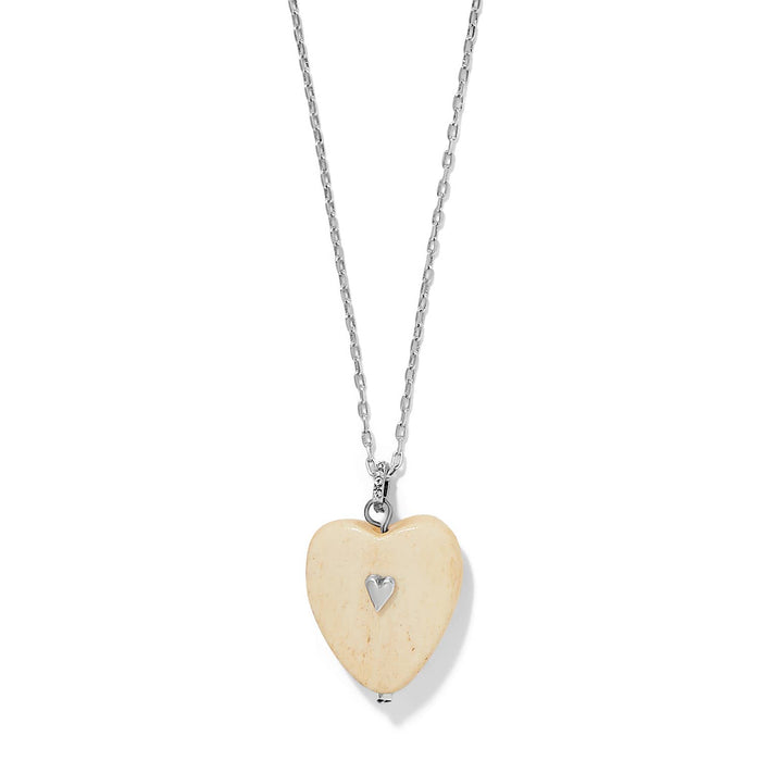 Brighton pendant necklace with cream wood heart, silver-plated heart accent, and silver-plated chain on a white background