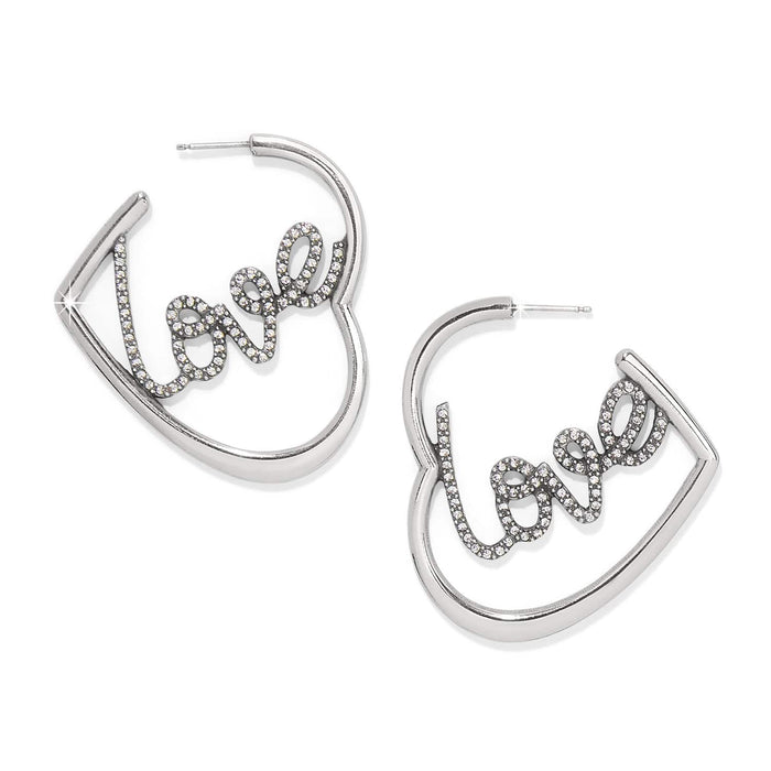 Brighton heart hoop earrings with silver-plated finish and crystal-encrusted love script on a white background