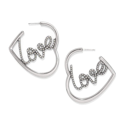 Brighton heart hoop earrings with silver-plated finish and crystal-encrusted love script on a white background