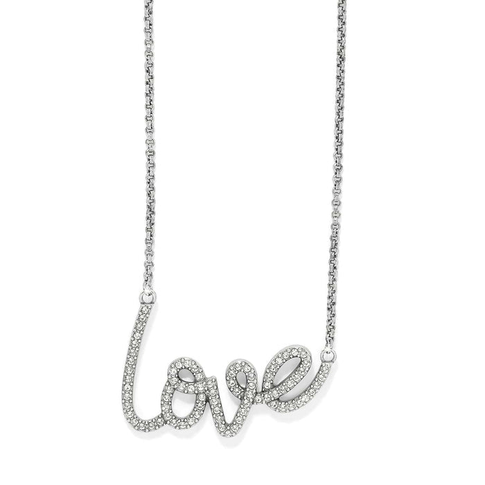 Brighton necklace with silver-plated cursive love script pendant set with fine quality crystals on a white background