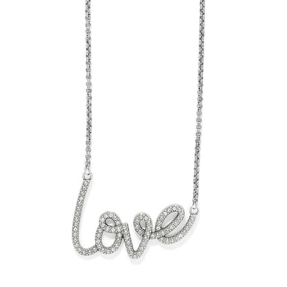 Brighton necklace with silver-plated cursive love script pendant set with fine quality crystals on a white background