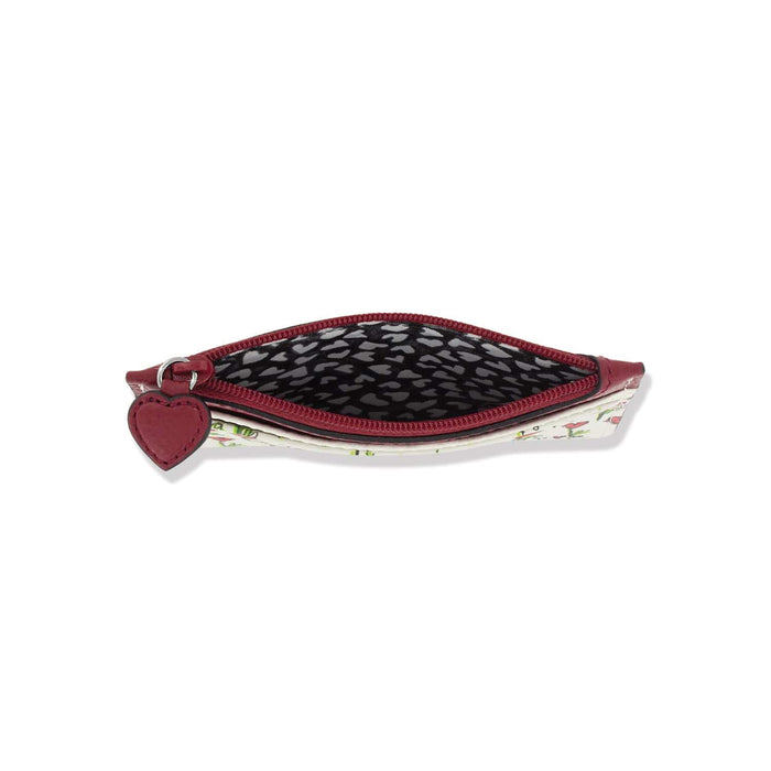 Brighton zip pouch shown open with red leather trim, heart-shaped zipper pull, and patterned interior on a white background