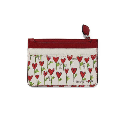 Brighton zip card case with red heart and love print, red leather trim, and heart pull on a white background
