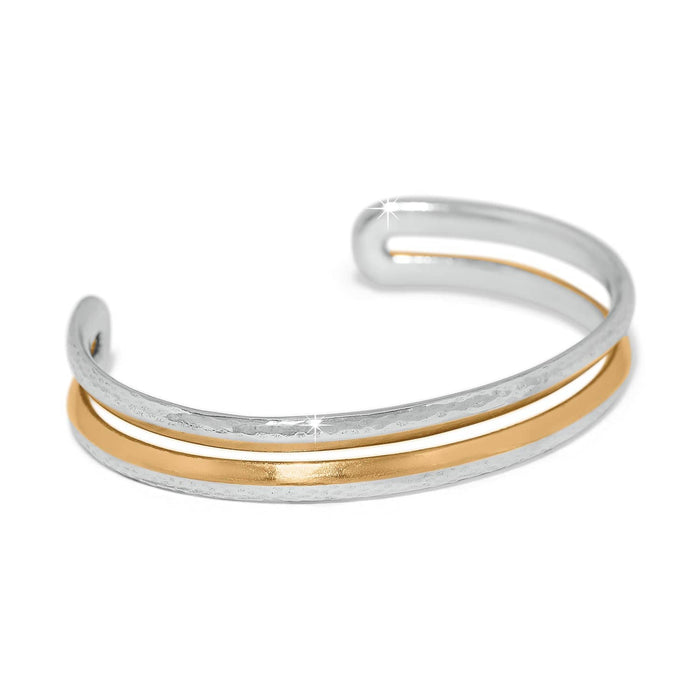 Brighton cuff bracelet with hammered silver-tone outer bands and smooth gold-tone center band on a white background