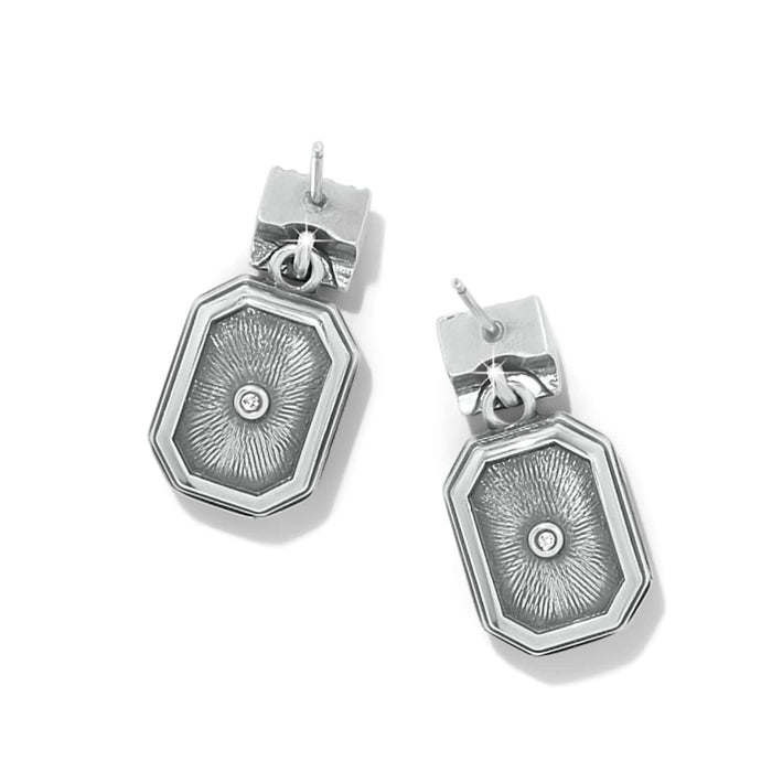 Brighton drop earrings with silver-plated octagonal pendants featuring radiating texture and center crystal accents on a white background