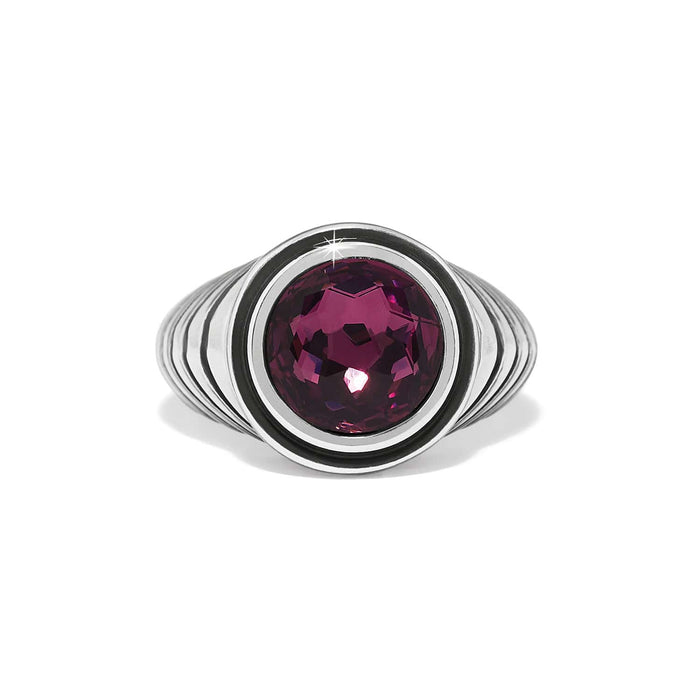 Brighton ring with faceted purple crystal center stone and silver-plated ribbed band on a white background