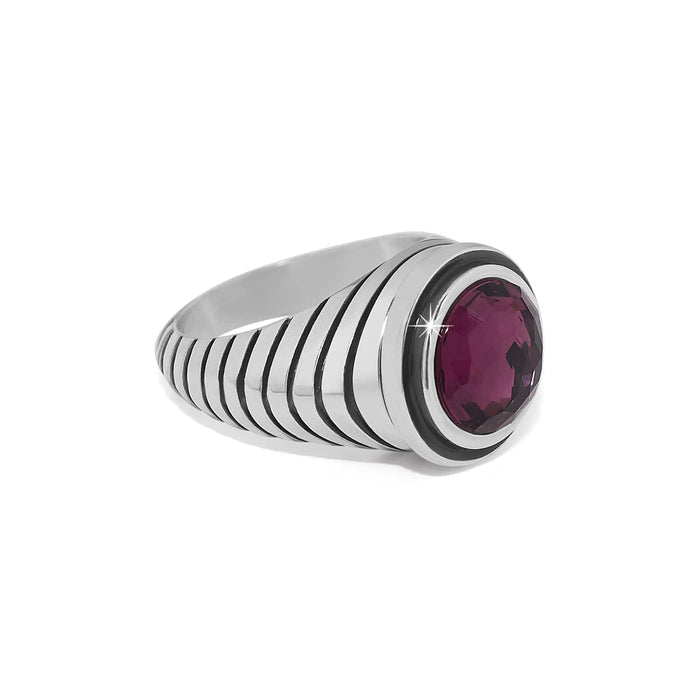 Brighton ring with silver-plated ribbed band and round purple crystal in bezel setting on a white background