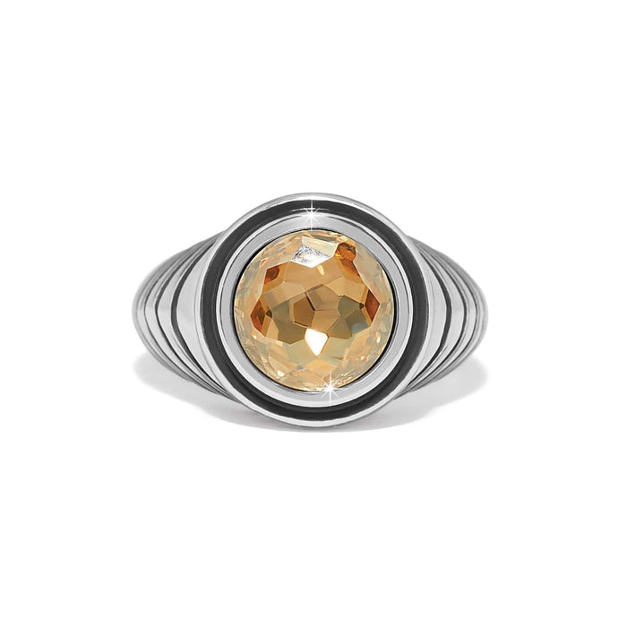 Brighton ring with round champagne crystal center, black enamel border, and silver-plated ribbed band on a white background