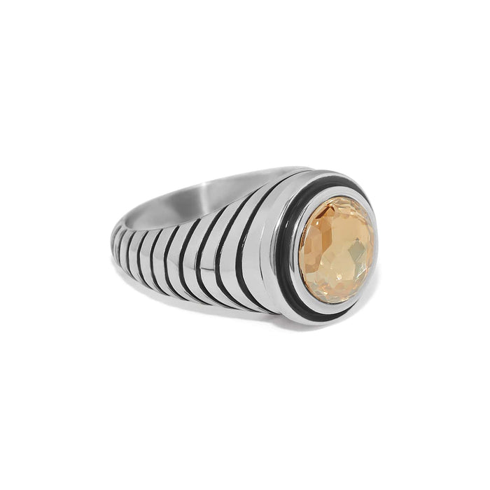 Brighton ring with round champagne crystal center and silver-plated ribbed band on a white background