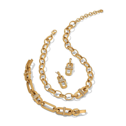 Brighton gold-plated chain necklace, bracelet, and drop earrings set with crystal-accented link details on a white background
