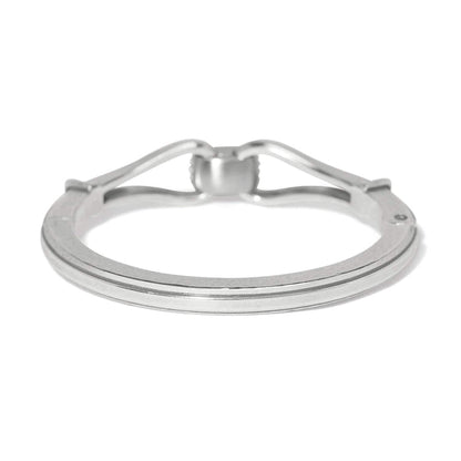 Brighton ring shown from the back with silver-tone band and open scrolled shoulder details on a white background