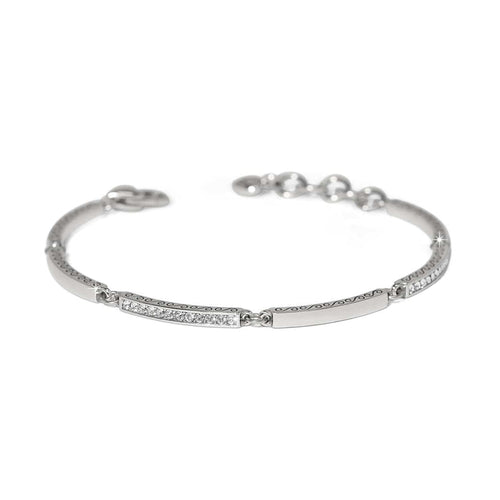 Brighton bangle bracelet with silver-plated finish, crystal-set bars, scroll engraving, and adjustable chain on a white background