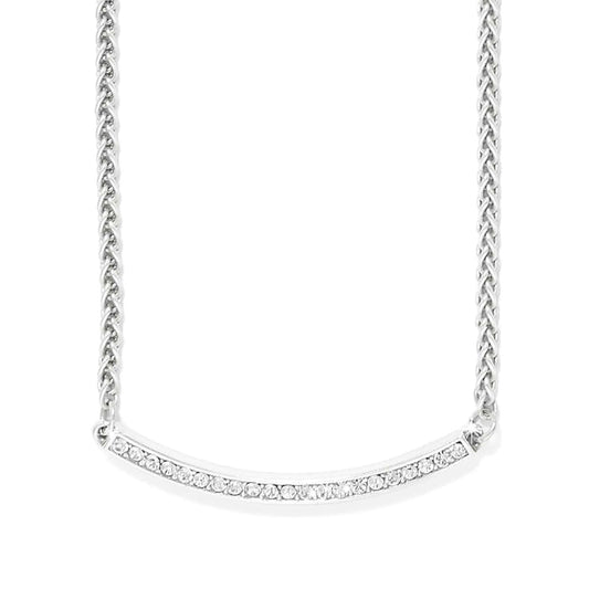 Brighton necklace with silver-plated wheat chain and curved crystal-set bar pendant on a white background