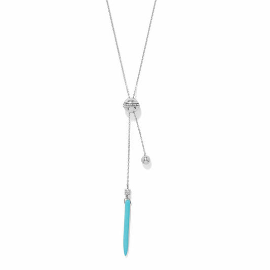 Brighton lariat necklace with silver-plated bead, crystal accents, and blue howlite turquoise drop on a white background