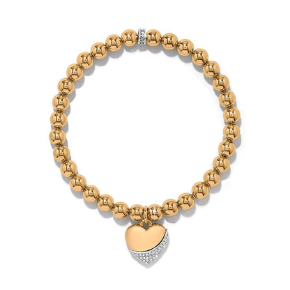 Brighton beaded stretch bracelet with gold-plated beads and crystal-accented heart charm on a white background