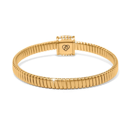 Brighton bangle bracelet in gold-plated finish with ribbed texture and crystal-accented clasp on a white background